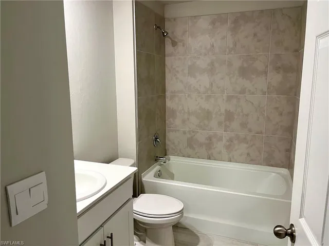 a view of a park with a tree