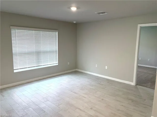 an empty room with a window