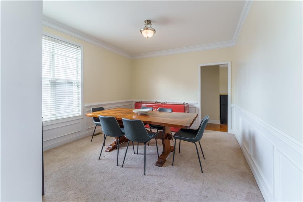 976 Redstone Road Dacula, GA 30019 - Photo 21 of 43 a view of a dining room with furniture and window
