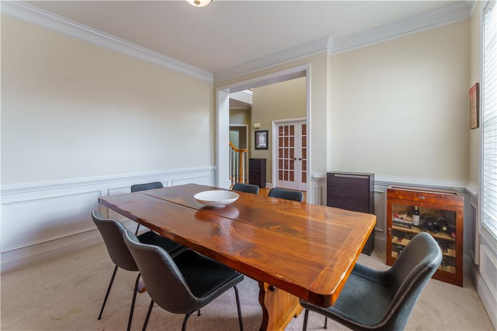 976 Redstone Road Dacula, GA 30019 - Photo 22 of 43 a view of a dining room with furniture
