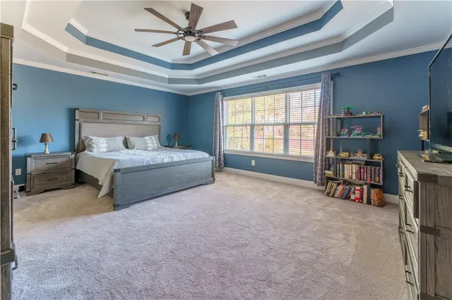 a bathroom with a glass door shower a sink and a mirror
