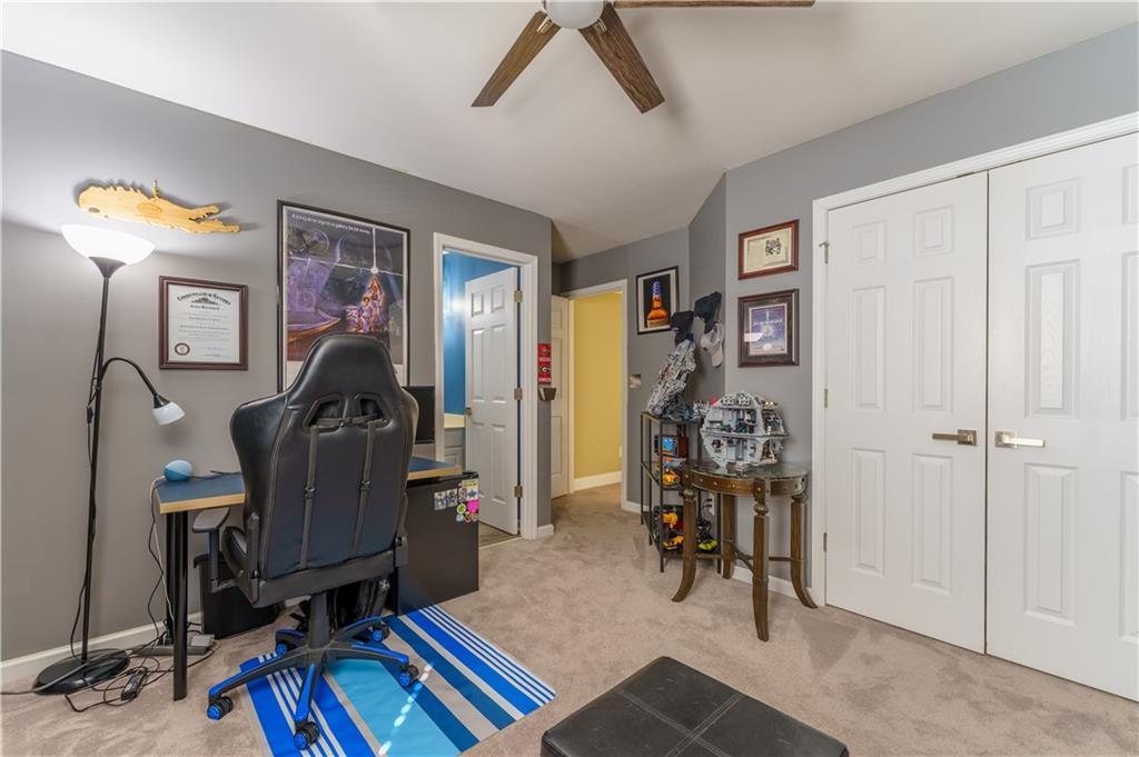 976 Redstone Road Dacula, GA 30019 - Photo 36 of 43 a view of a room with gym equipment