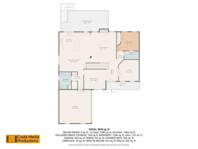 a hallway with a dining table and chairs