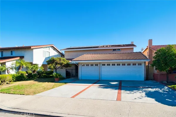 a view of a house with a garage