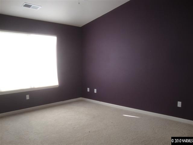 10255 Lucente Way Reno, NV 89521 - Photo 7 of 10 an empty room with a window