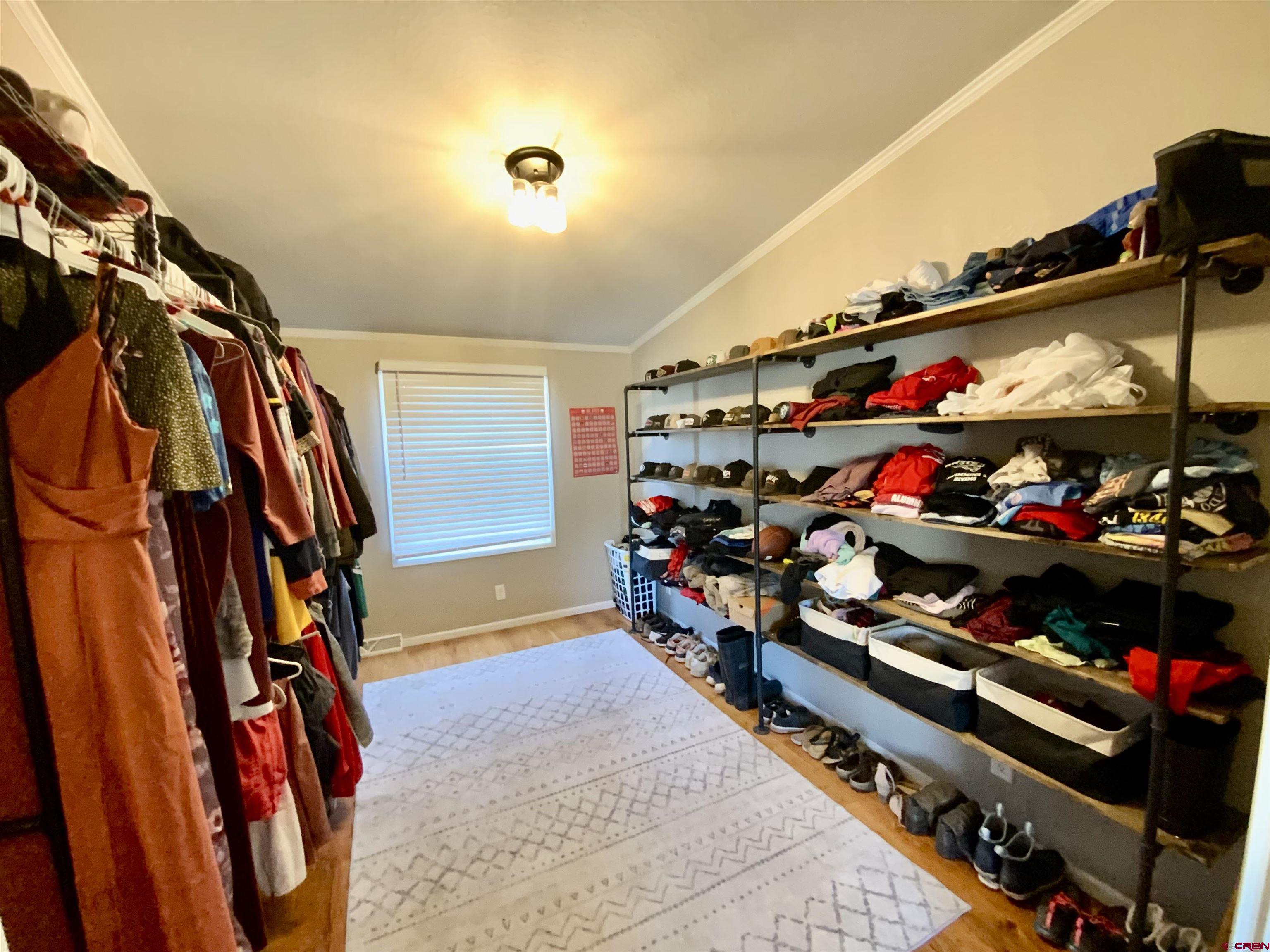 13 Ridge Lane Gunnison, CO 81230 - Photo 15 of 24 a view of a storage room with shoes