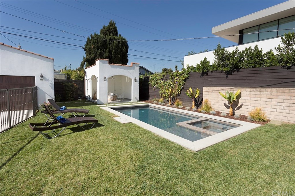 631 North Lucerne Boulevard Los Angeles, CA 90004 - Photo 16 of 21 a view of a swimming pool with a patio