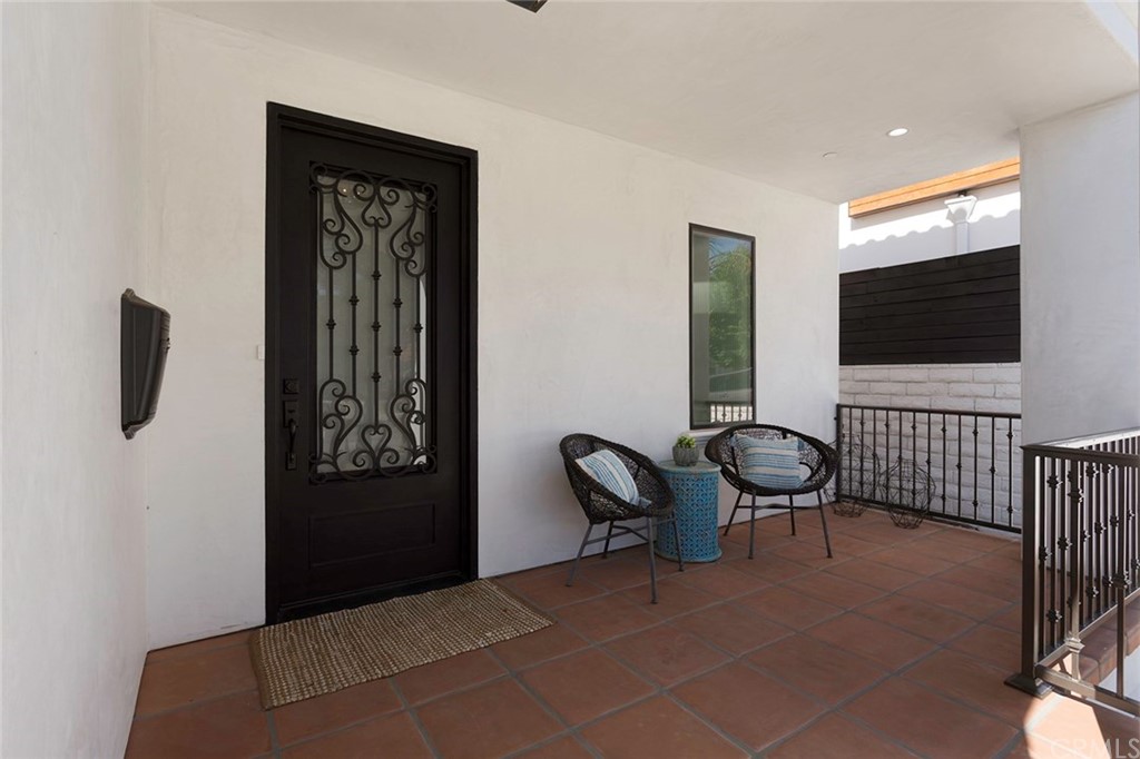 631 North Lucerne Boulevard Los Angeles, CA 90004 - Photo 2 of 21 a view of a livingroom with furniture and a flat screen tv