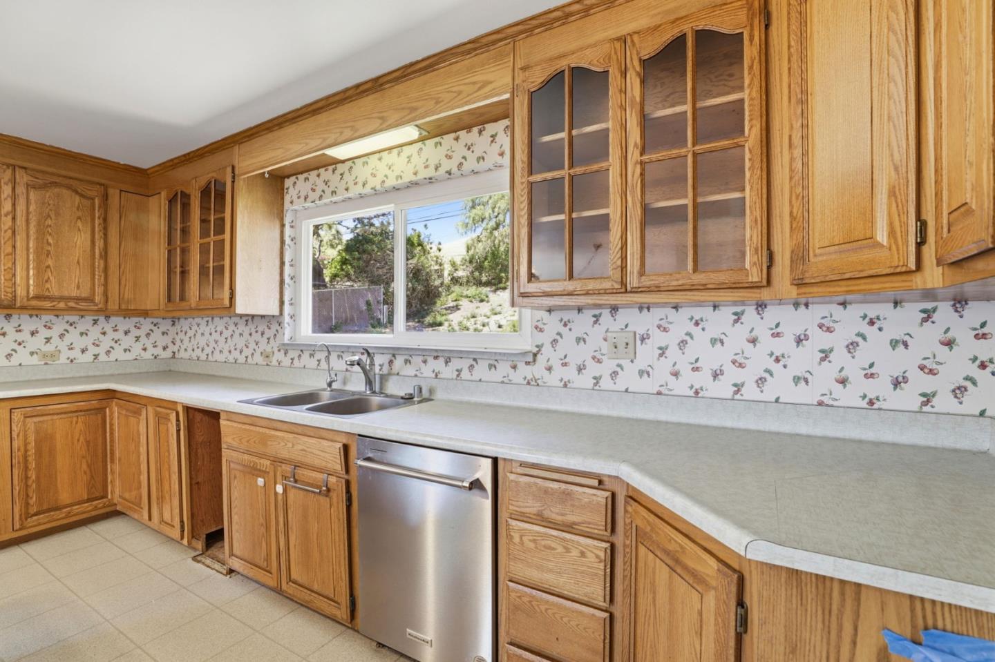 208 Mill Creek Road Fremont, CA 94539 - Photo 13 of 59 a kitchen with granite countertop cabinets sink and window