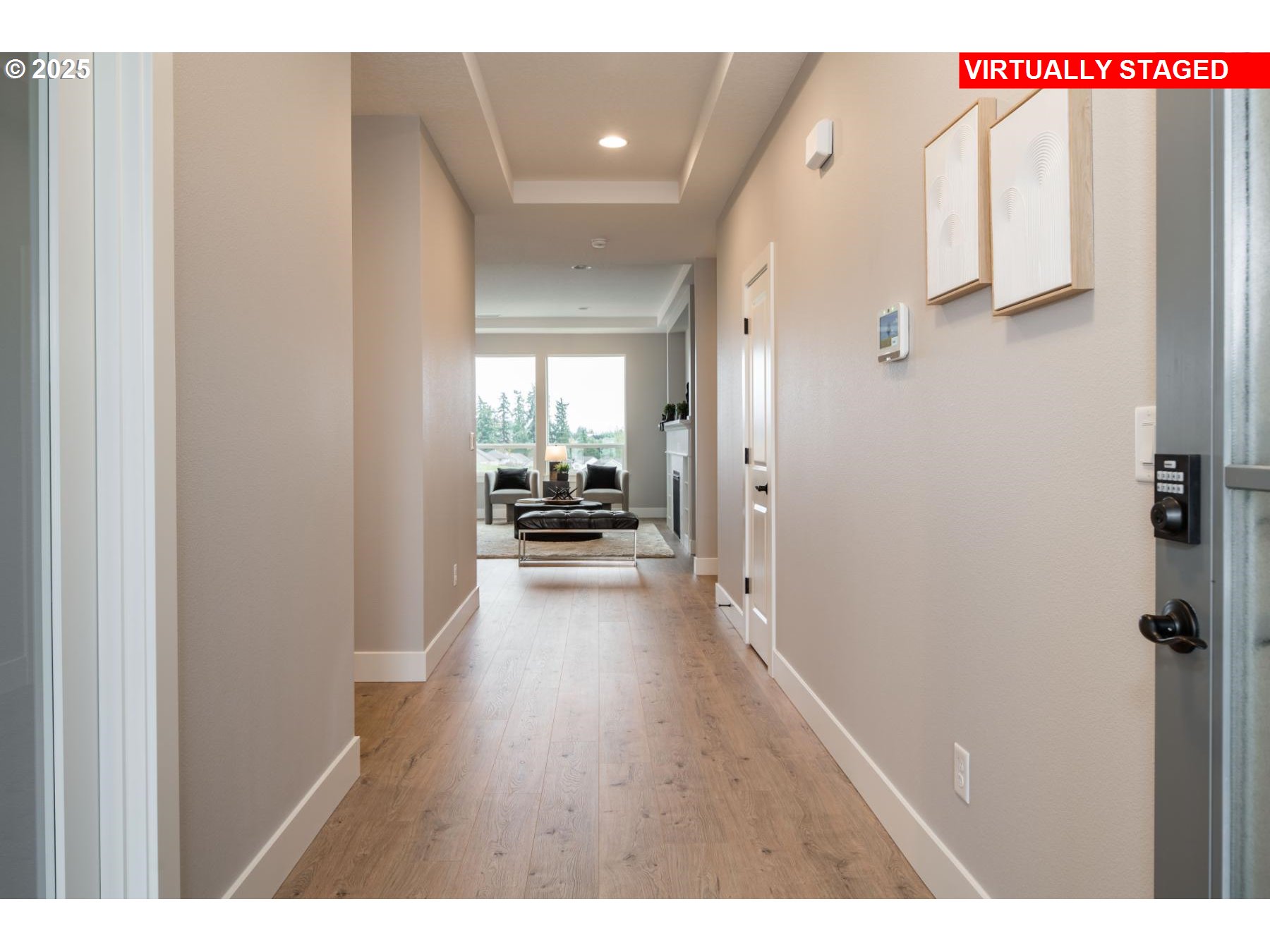 1303 South 46th Place Ridgefield, WA 98642 - Photo 2 of 13 a view of a hallway with a living room