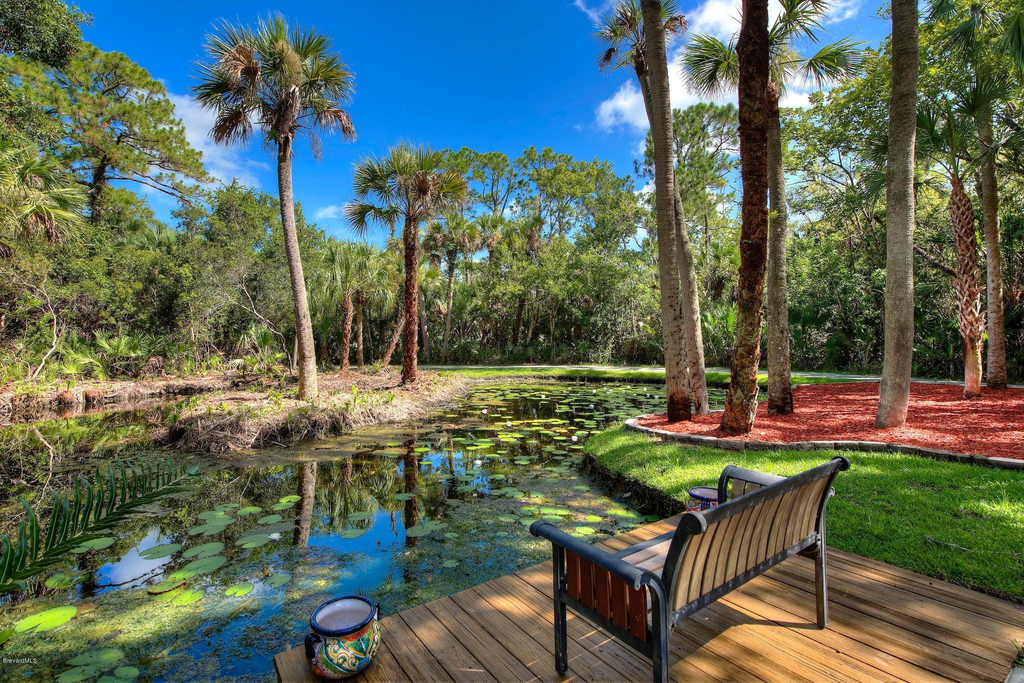 4465 Country Road Melbourne, FL 32934 - Photo 3 of 25 SHADED SITTING AREA
