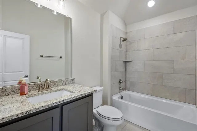 a bedroom with bed and a window