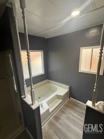 a bathroom with a sink and mirror