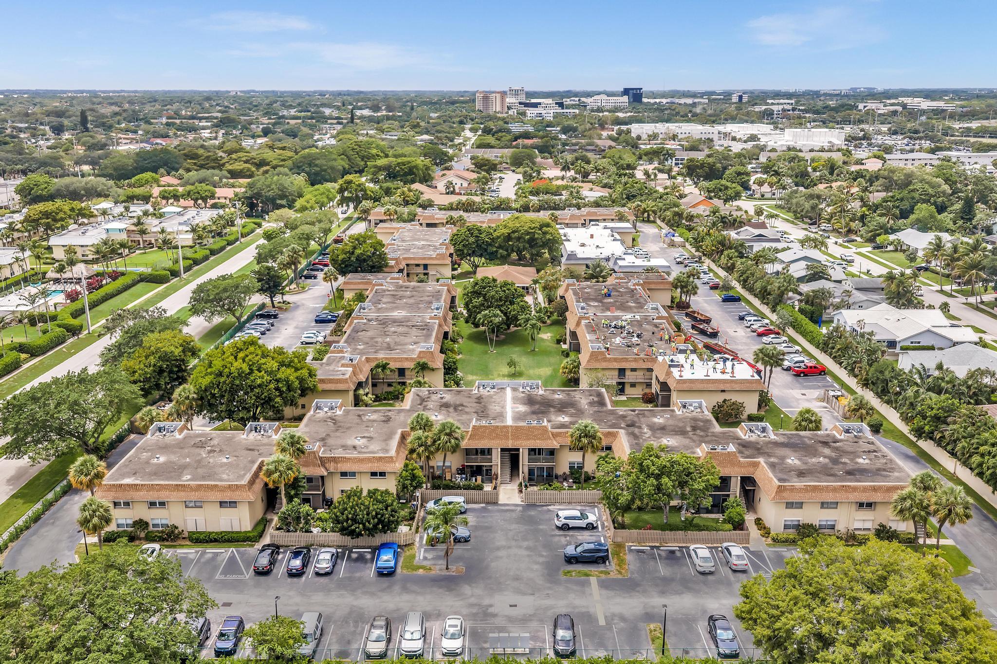 1291 Northwest 13th Street, Unit 445D Boca Raton, FL 33486 - Photo 48 of 50 an aerial view of a city
