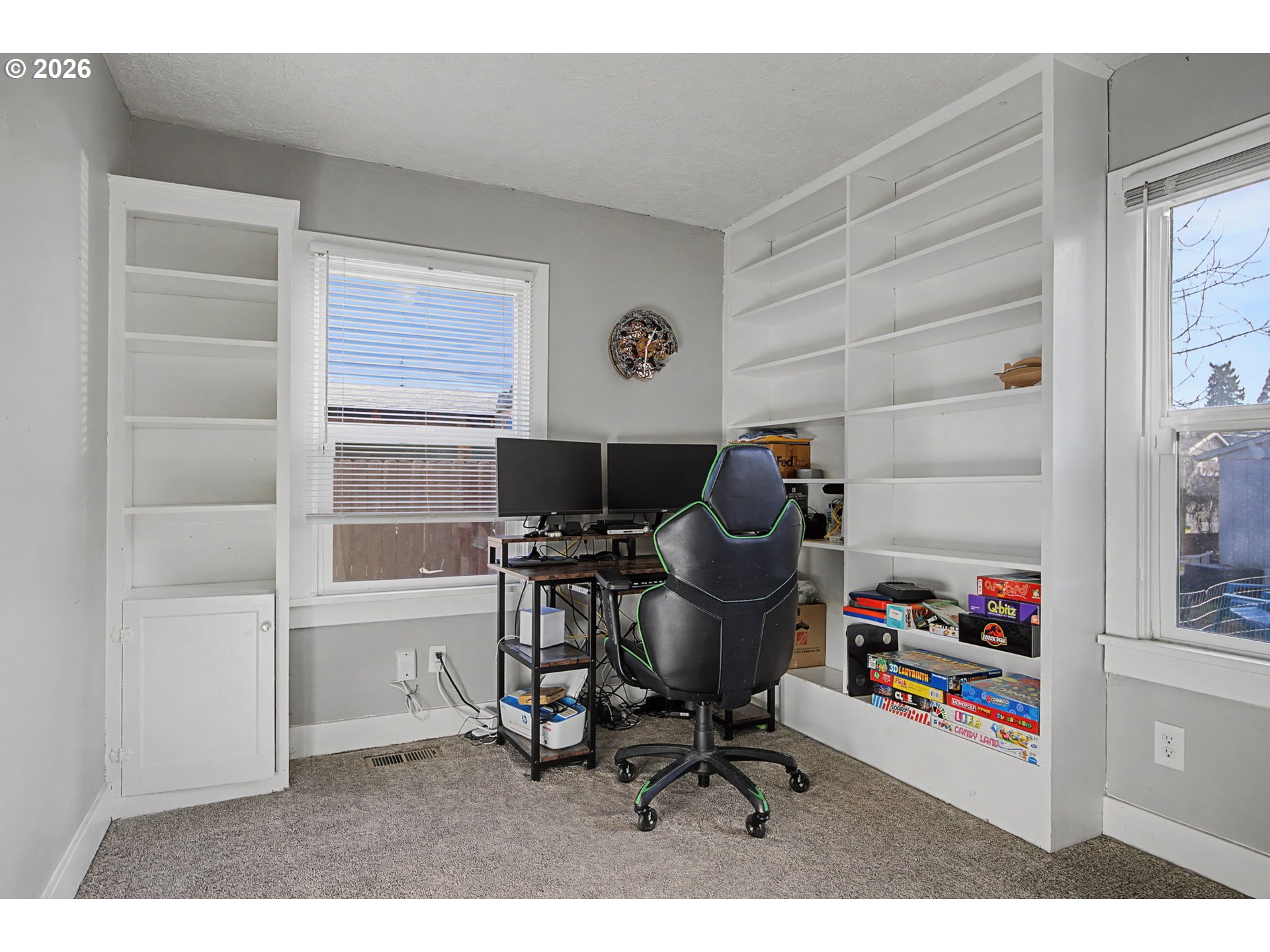 7808 Southeast Roots Road Milwaukie, OR 97267 - Photo 5 of 13 a workspace with furniture and a window