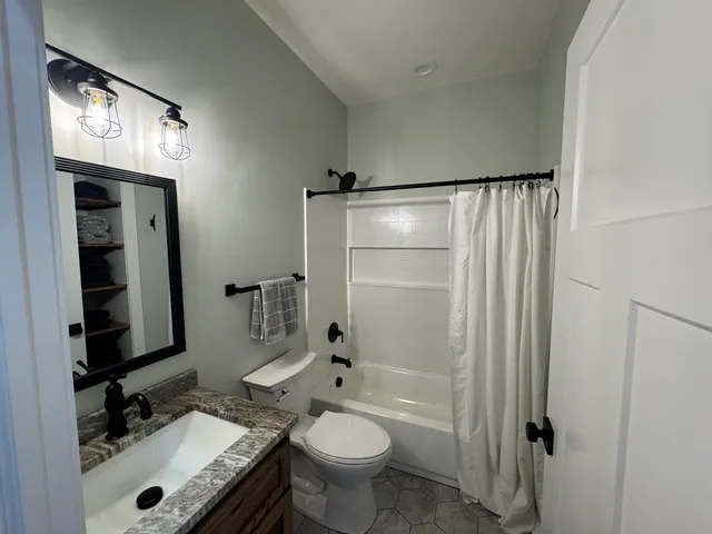 $544,000 | 110 Bedford Court, Cadillac, MI 49601