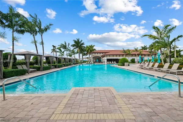 a view of a swimming pool with a patio