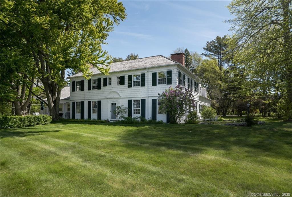 246 Old Black Point Road East Lyme, CT 06357 - Photo 1 of 1 a front view of a house with a garden