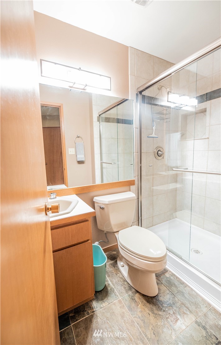 36815 Mann Road Sultan, WA 98294 - Photo 23 of 38 a bathroom with a toilet sink and shower