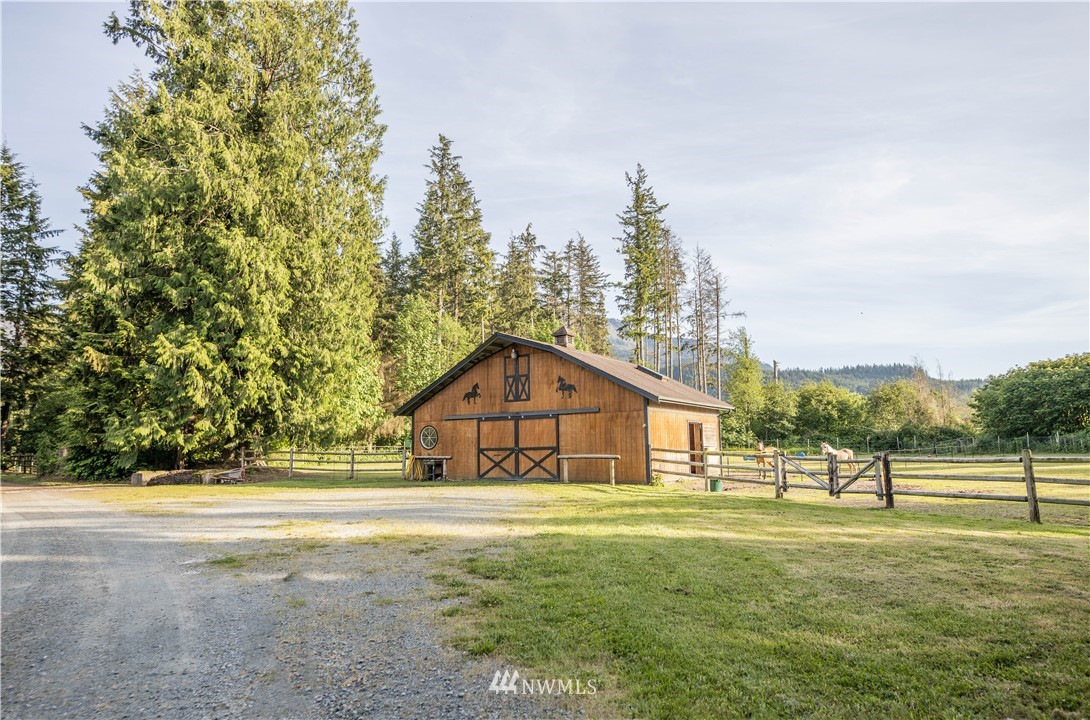 36815 Mann Road Sultan, WA 98294 - Photo 25 of 38 a front view of a house with a yard