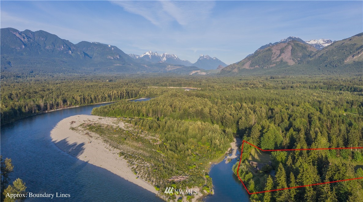 36815 Mann Road Sultan, WA 98294 - Photo 31 of 38 a view of a lake with a mountain