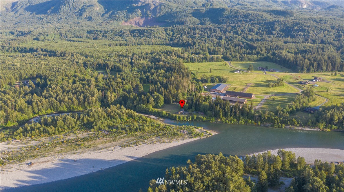 36815 Mann Road Sultan, WA 98294 - Photo 32 of 38 a view of a lake with a yard