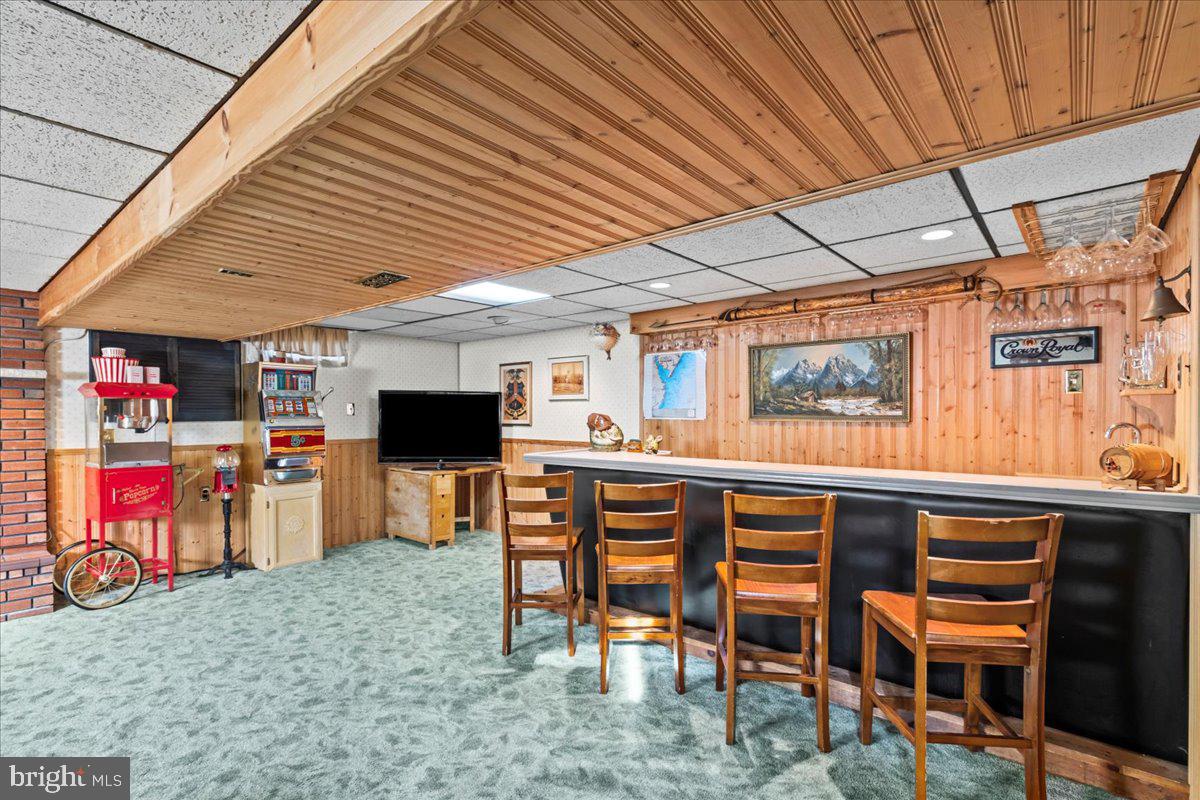 63 Estates Road Pine Hill, NJ 08021 - Photo 26 of 46 lower level bar area
