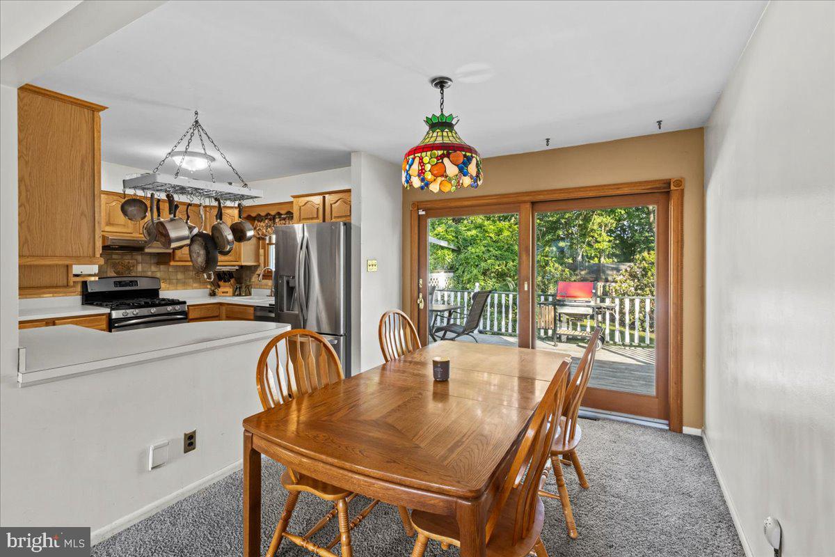 63 Estates Road Pine Hill, NJ 08021 - Photo 8 of 46 Dining room facing deck