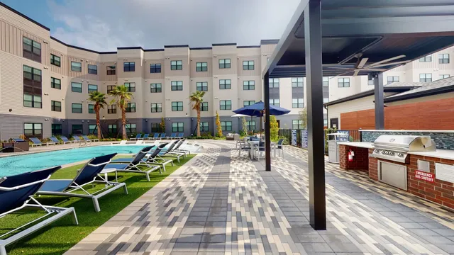 a view of a chairs and table in the patio