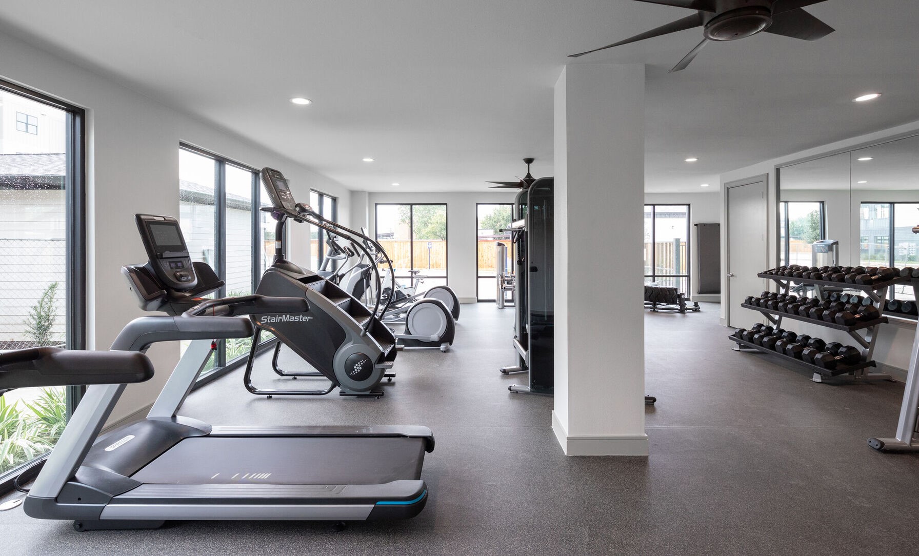 1148 Silber Road, Unit 8301 Houston, TX 77055 - Photo 26 of 36 a view of a room with gym equipment