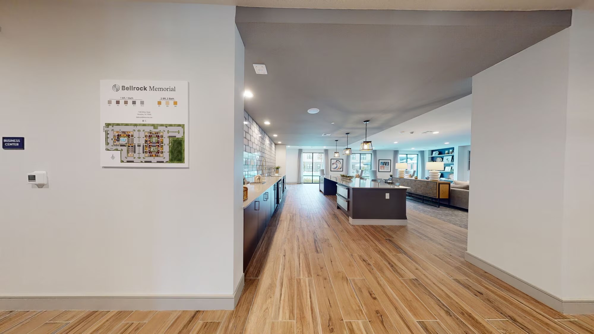 1148 Silber Road, Unit 8301 Houston, TX 77055 - Photo 29 of 36 a view of a living room and kitchen with a large window