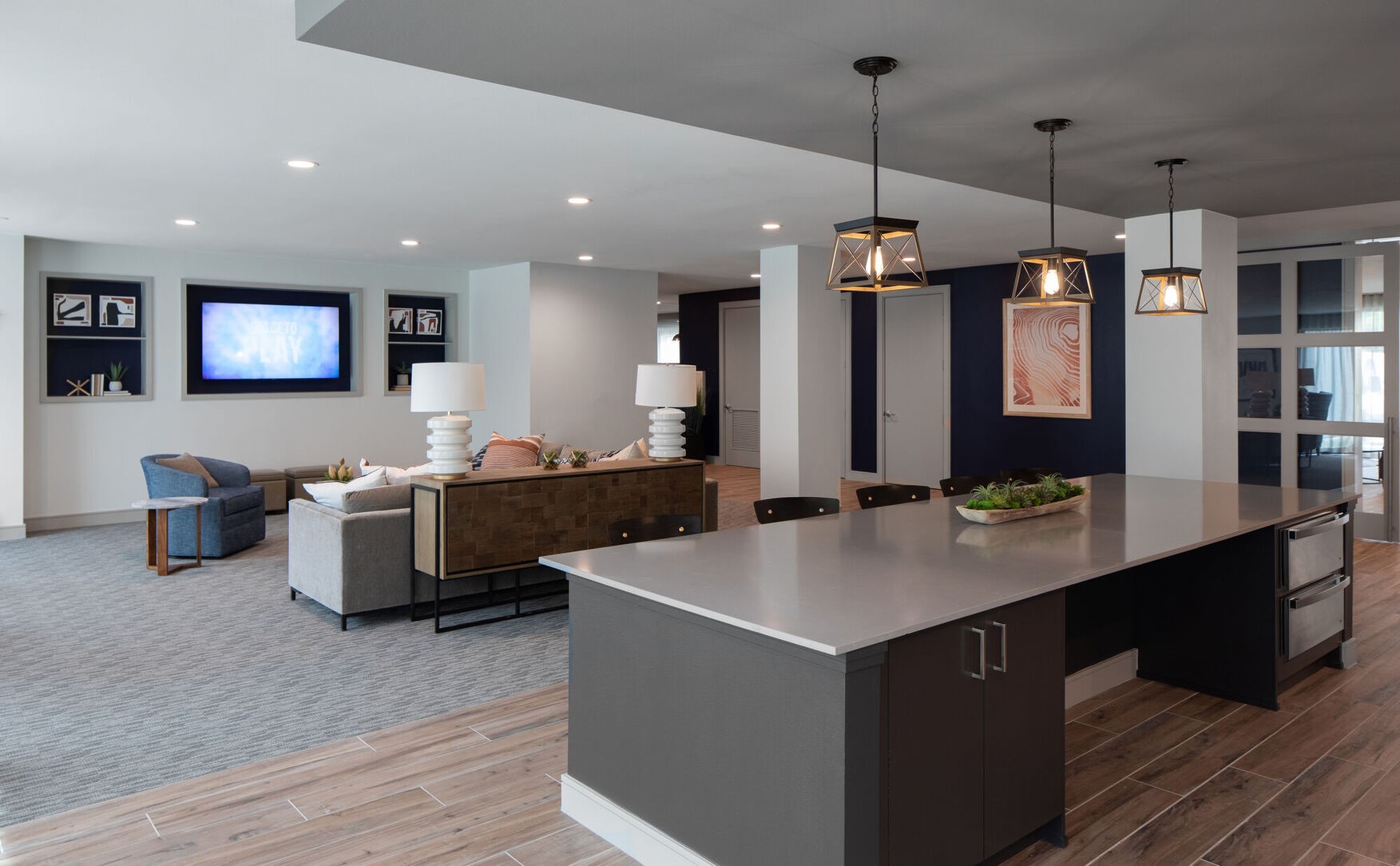 1148 Silber Road, Unit 8301 Houston, TX 77055 - Photo 35 of 36 a living room with couches a flat screen tv and kitchen view