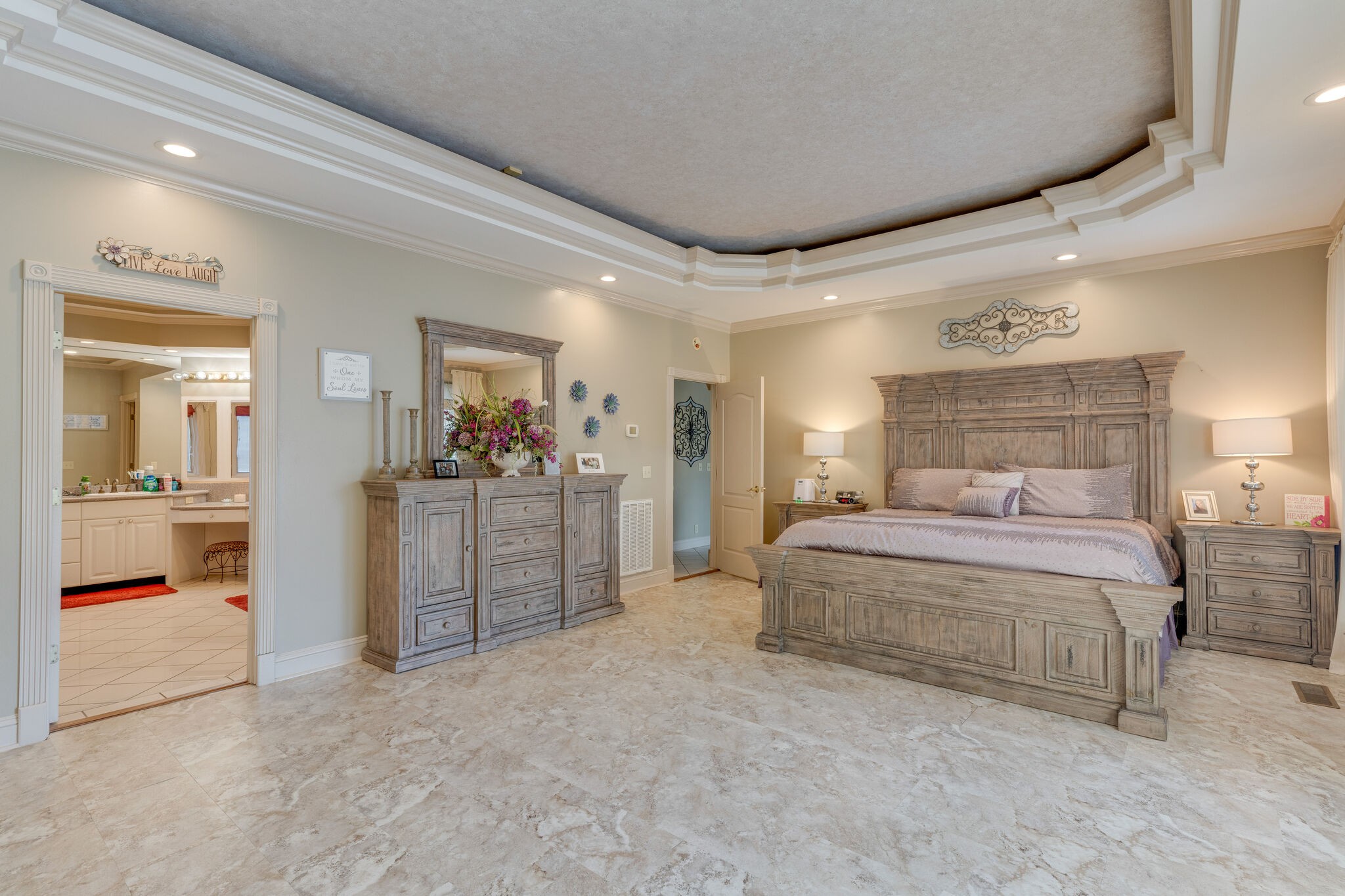 404 Denning Ford Road Portland, TN 37148 - Photo 18 of 30 a spacious bedroom with a bed and dresser