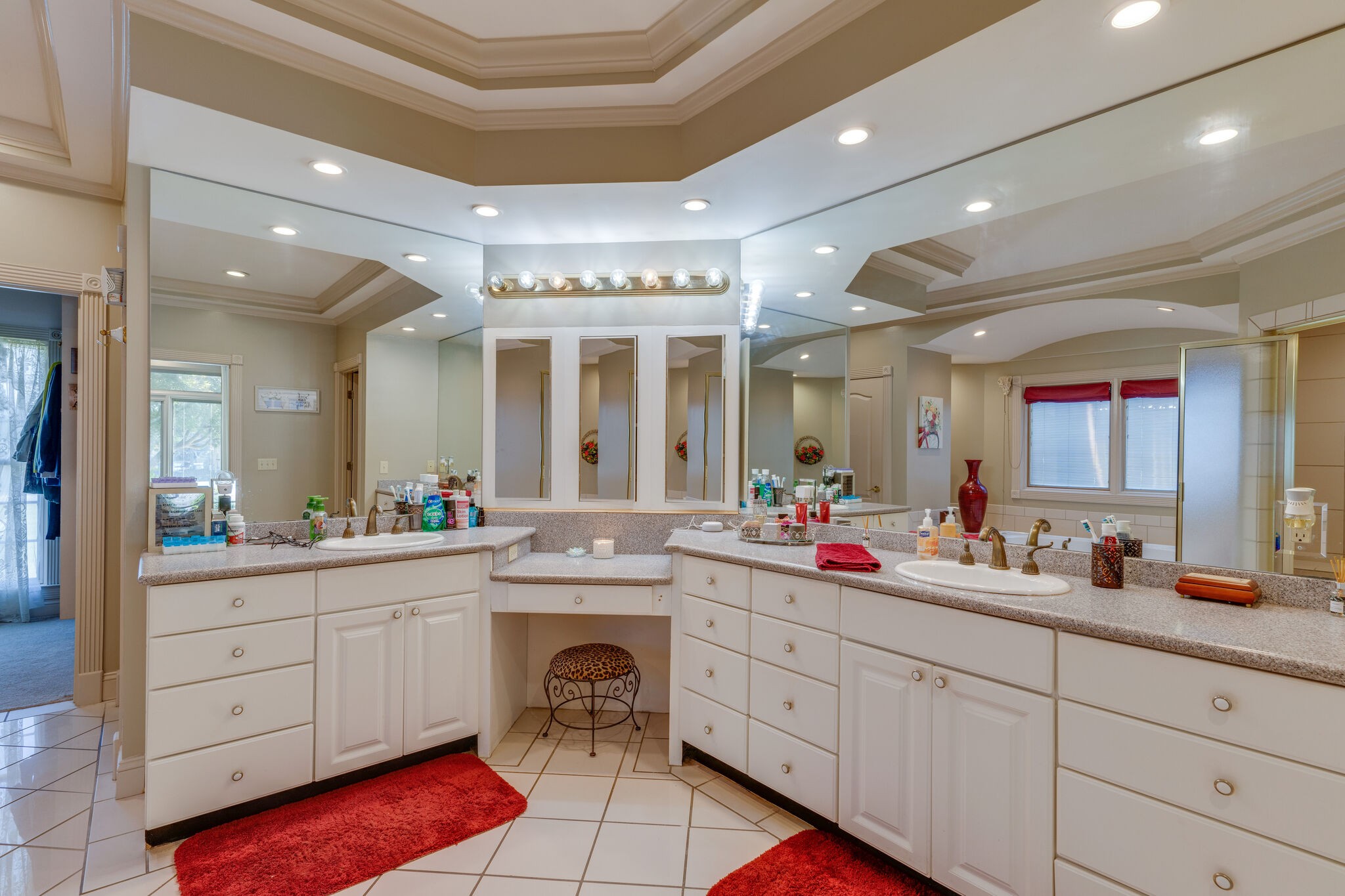 404 Denning Ford Road Portland, TN 37148 - Photo 19 of 30 a large white kitchen with a white countertops a sink and cabinets