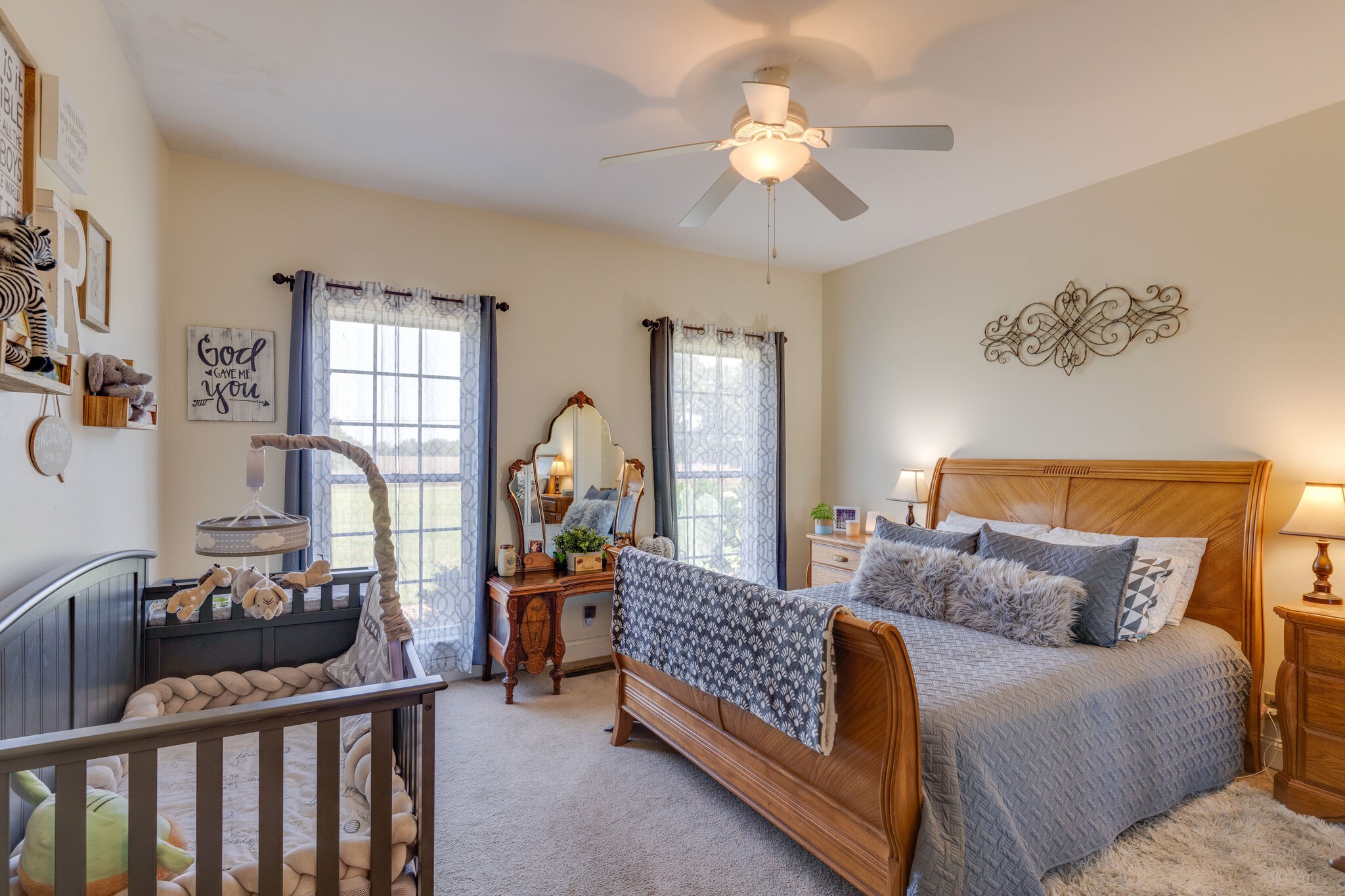404 Denning Ford Road Portland, TN 37148 - Photo 21 of 30 a living room with furniture a chandelier and a window