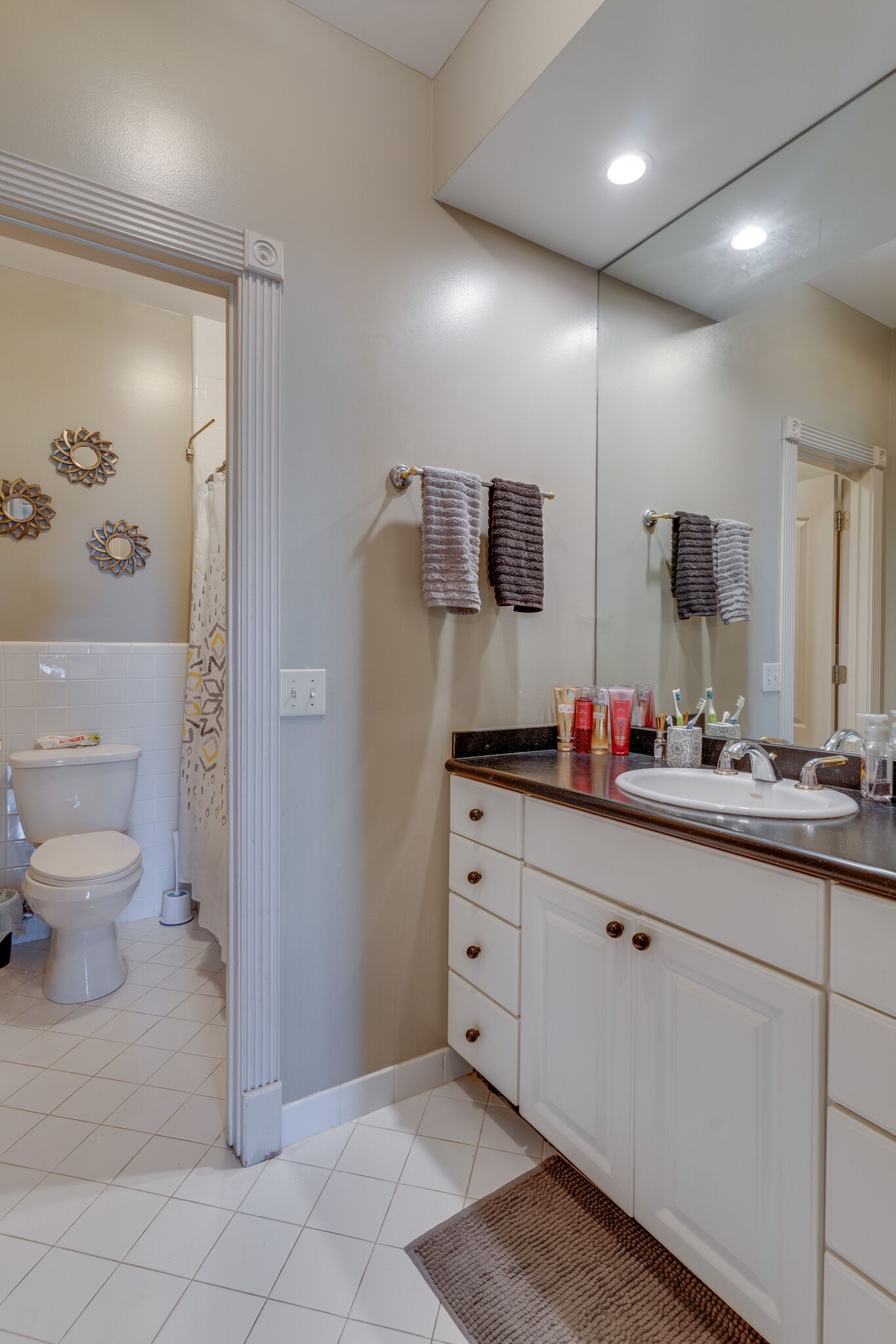 404 Denning Ford Road Portland, TN 37148 - Photo 25 of 30 a bathroom with a toilet sink and mirror