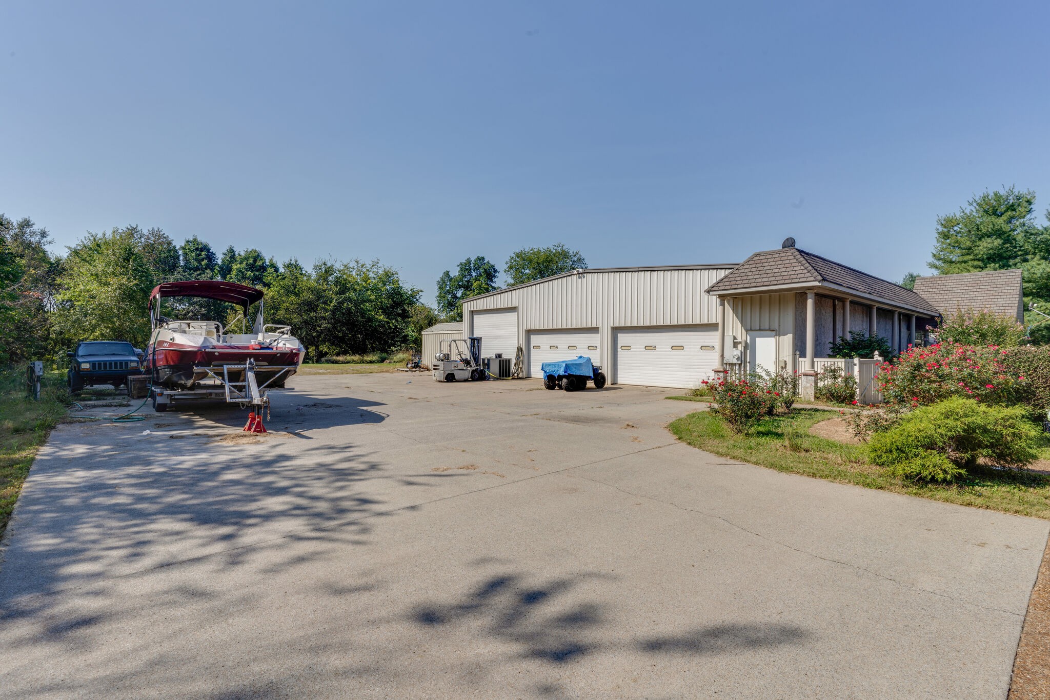 404 Denning Ford Road Portland, TN 37148 - Photo 29 of 30 a view of house with car parked beside of it
