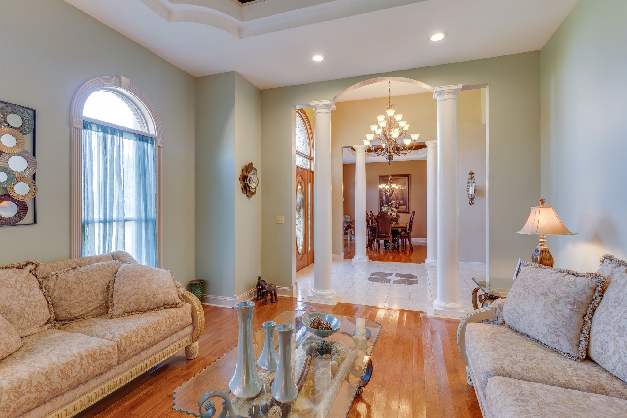 404 Denning Ford Road Portland, TN 37148 - Photo 7 of 30 a living room with furniture and a chandelier