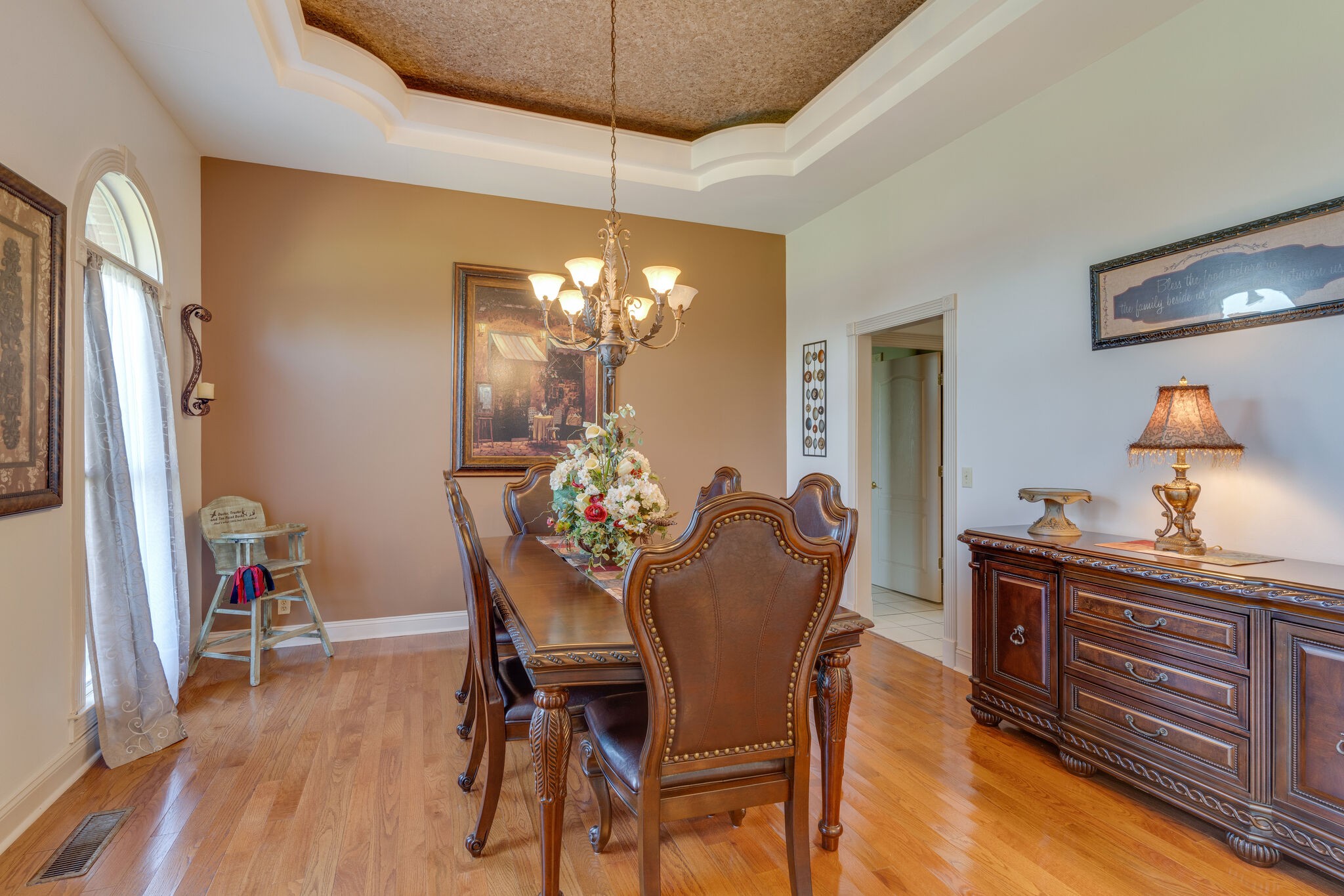 404 Denning Ford Road Portland, TN 37148 - Photo 8 of 30 a view of a dining room with furniture and chandelier