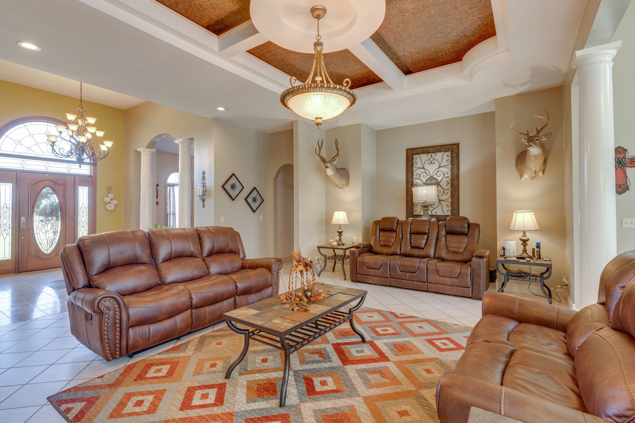 404 Denning Ford Road Portland, TN 37148 - Photo 10 of 30 a living room with furniture a chandelier and a rug