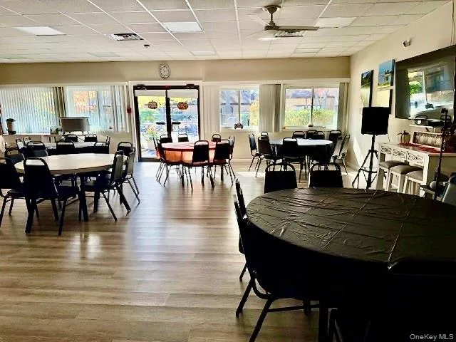 a view of a backyard with sitting area
