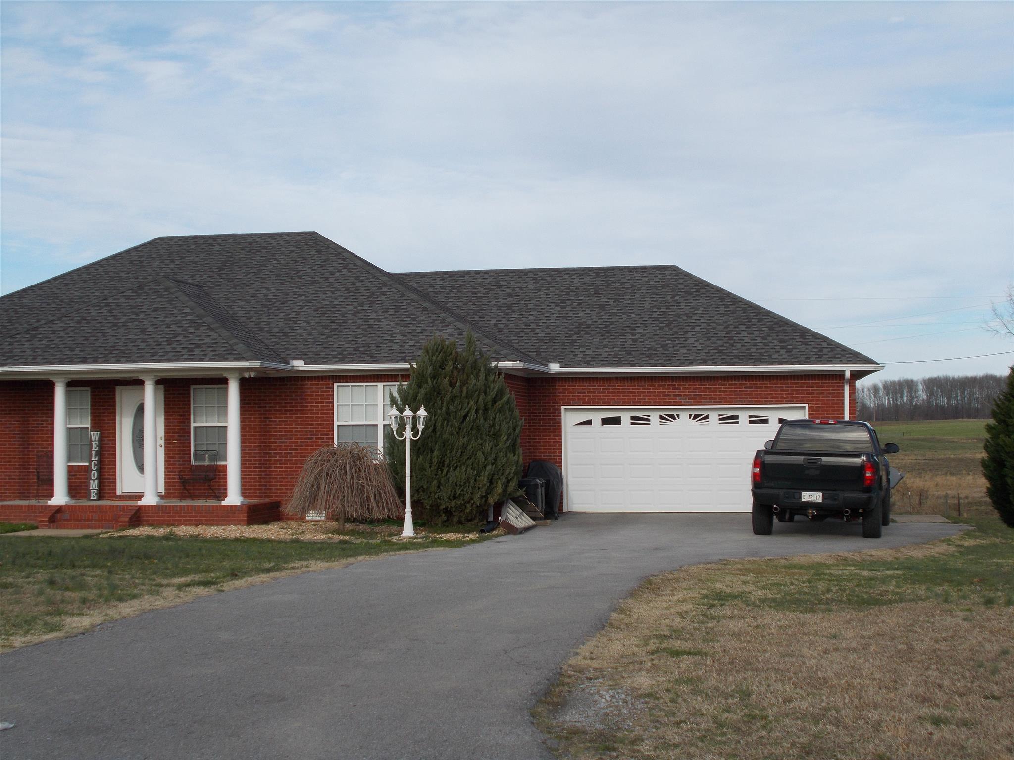 114 Martin Road Lawrenceburg, TN 38464 - Photo 3 of 11 front view of house with a yard
