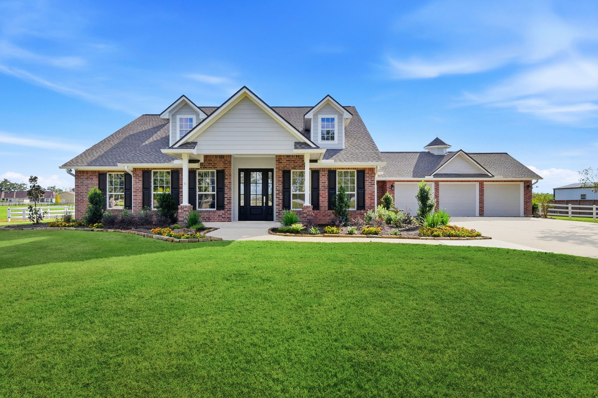 a front view of a house with swimming pool having outdoor seating