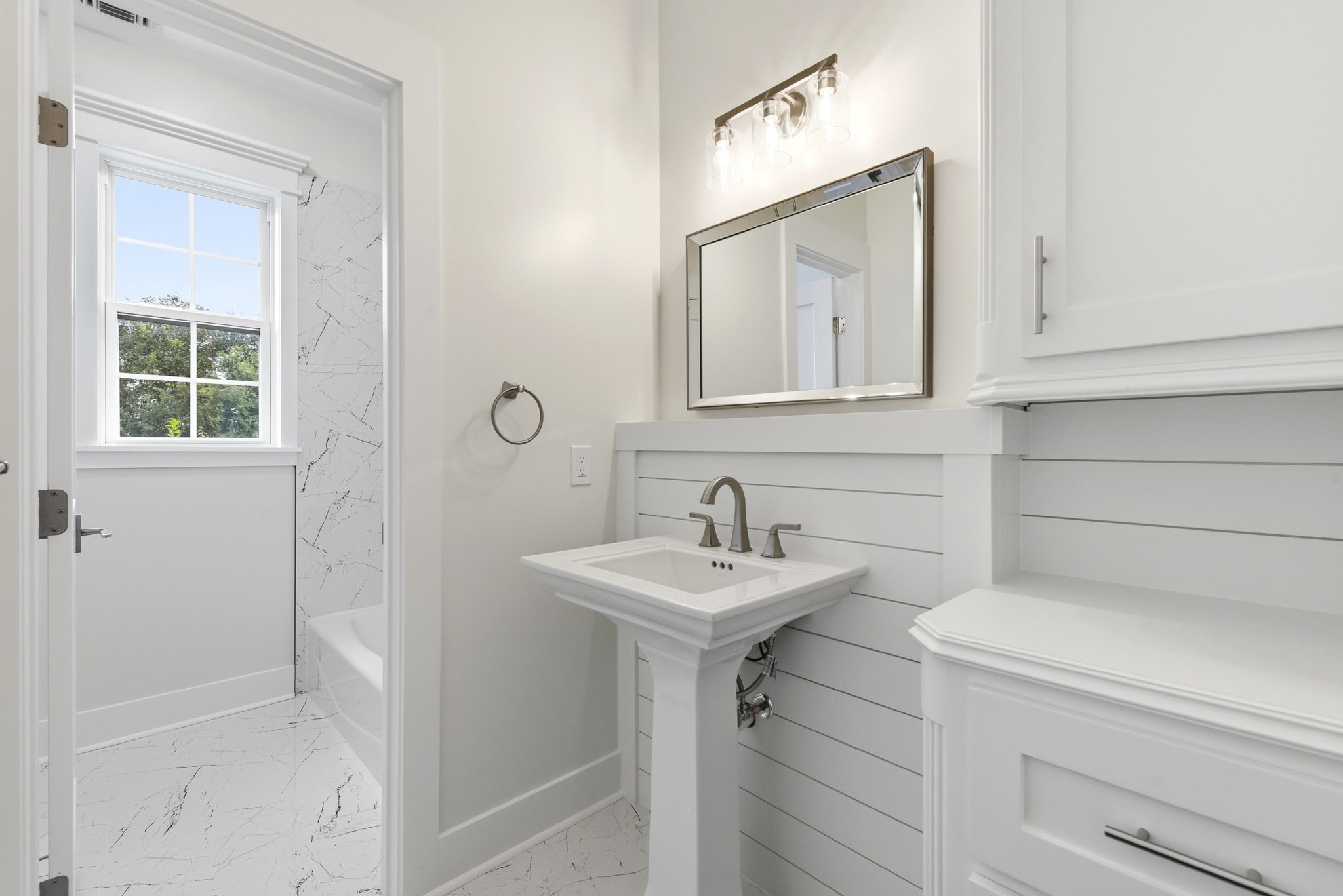 2819 Pearce Meadow Rosharon, TX 77583 - Photo 27 of 50 a bathroom with a sink a toilet and mirror