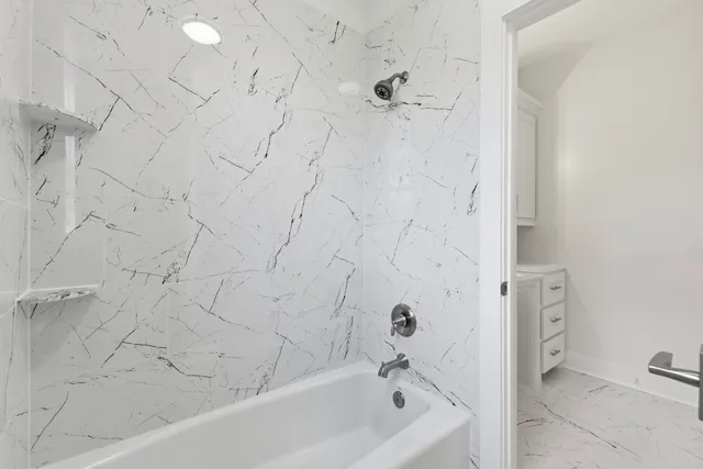 a bathroom with a bathtub