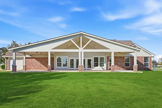 a view of a patio with a garden