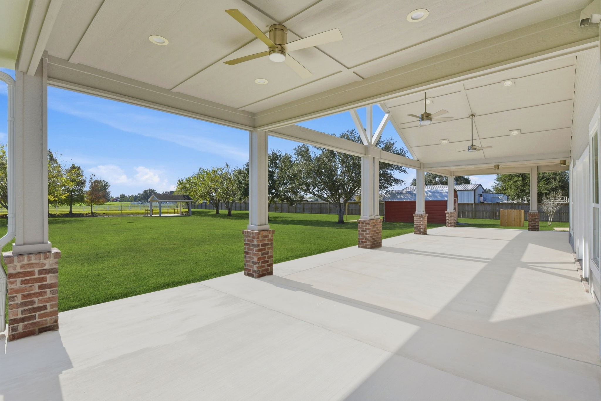 2819 Pearce Meadow Rosharon, TX 77583 - Photo 37 of 50 a view of a house with a backyard porch and sitting area