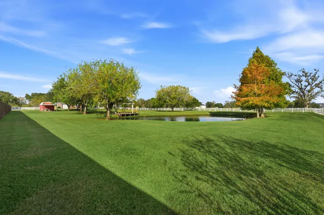 a view of swimming pool from a balcony