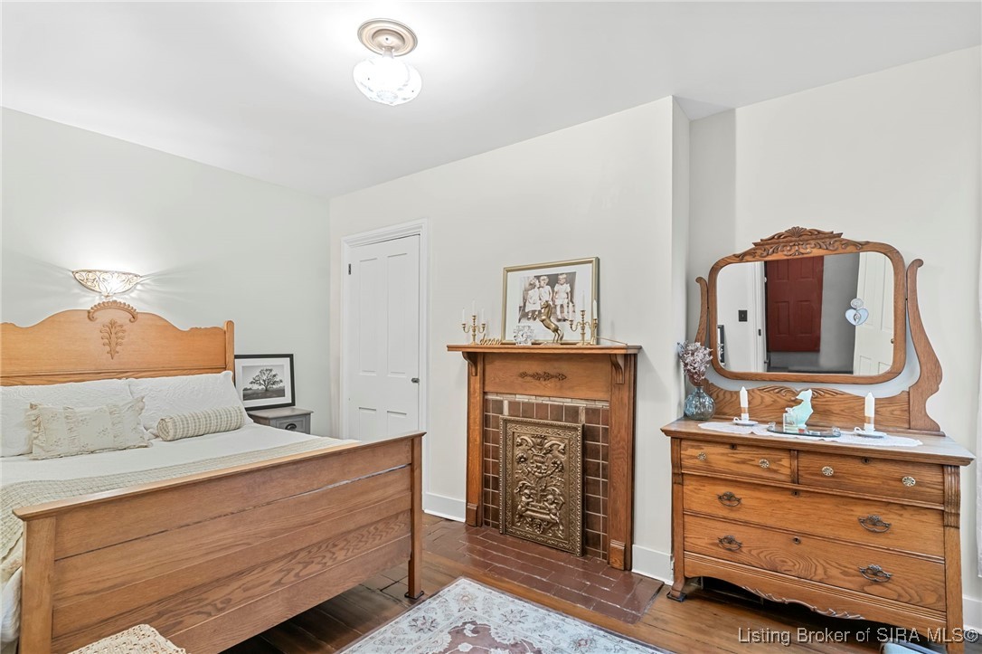 318 Walnut Street Madison, IN 47250 - Photo 11 of 26 Bedroom 1with decorative fireplace