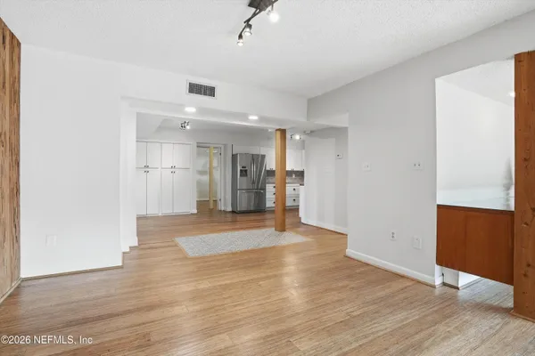 a workspace with furniture and a window